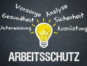 Bild mit der Aufschrift Arbeitsschutz und einer gelb leuchtenden Glühbirne.