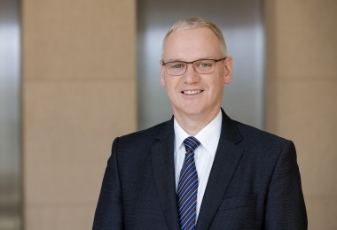 Portrait von Dr. Stefan Hussy, DGUV.