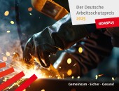Bild: Keyvisual des Deutschen Arbeitsschutzpreises 2025: Jemand schweißt, Funken sprühen
