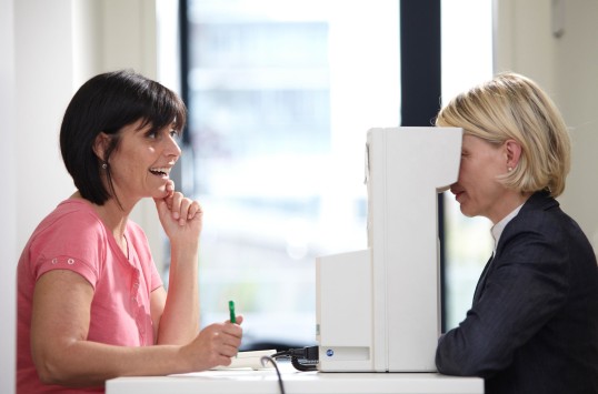 a woman with a eye-medical investigation